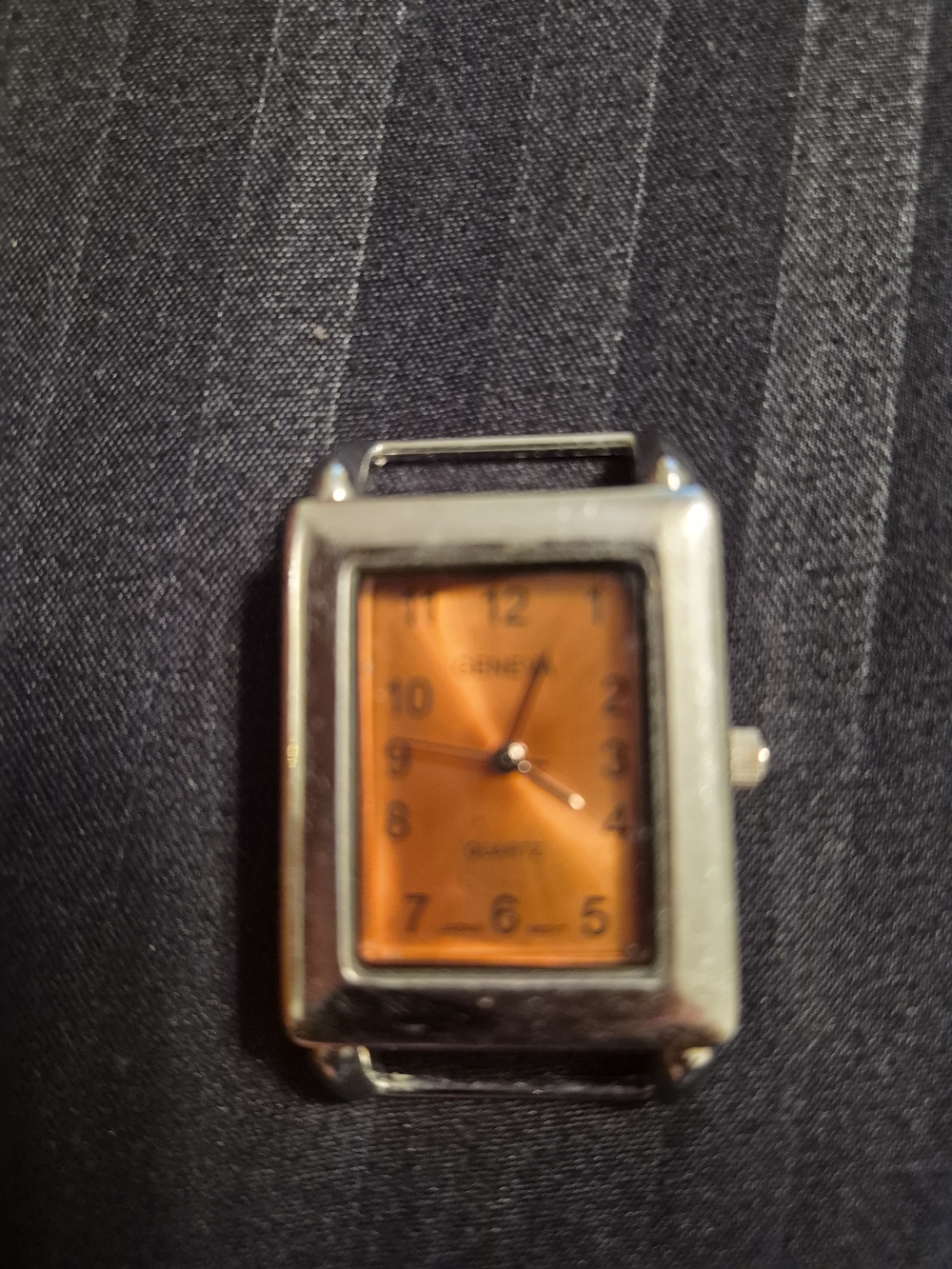 GENEVA Rectangular Silver Watch face with Orange Dial.